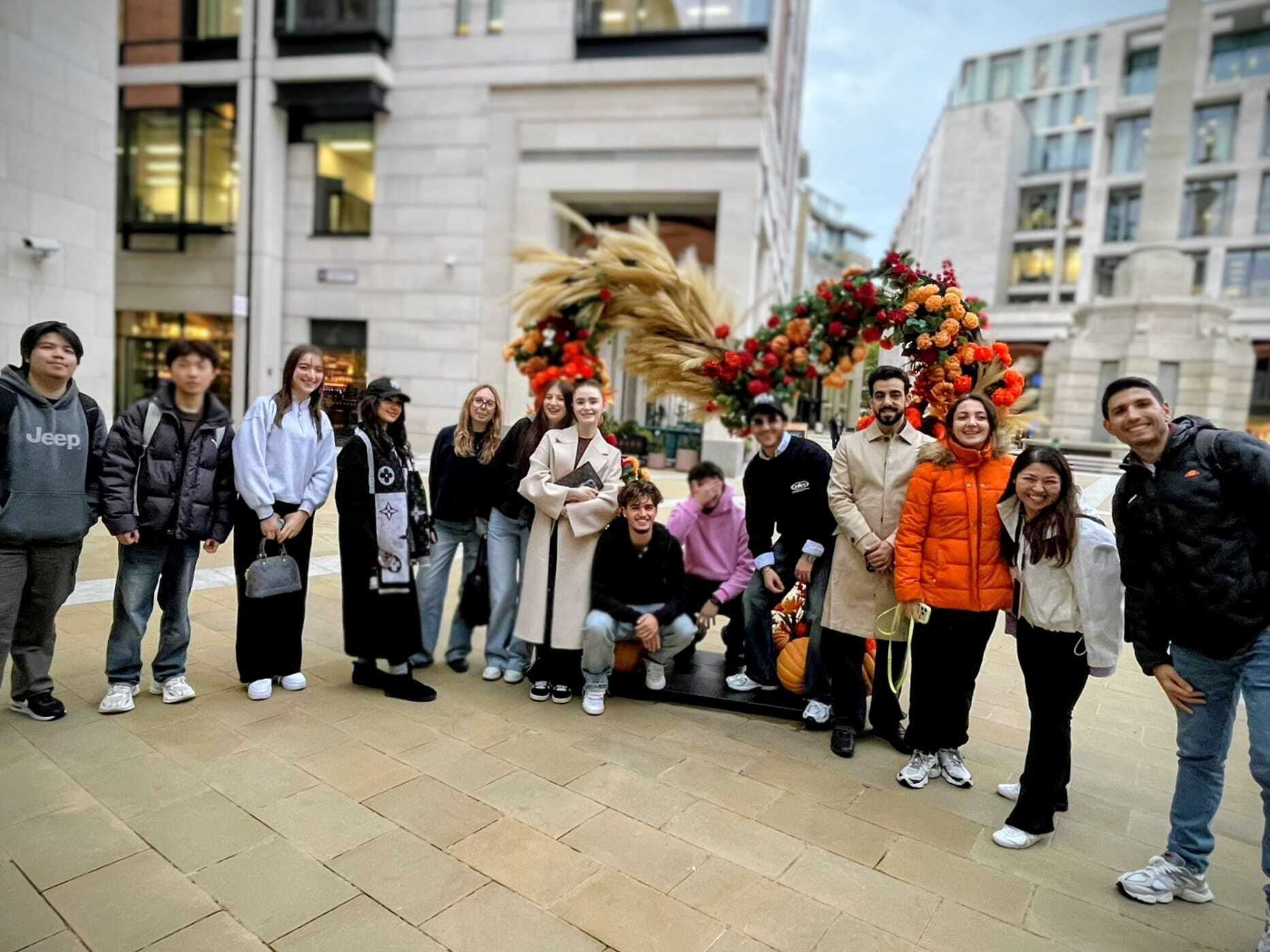 English students at an autumnal display
