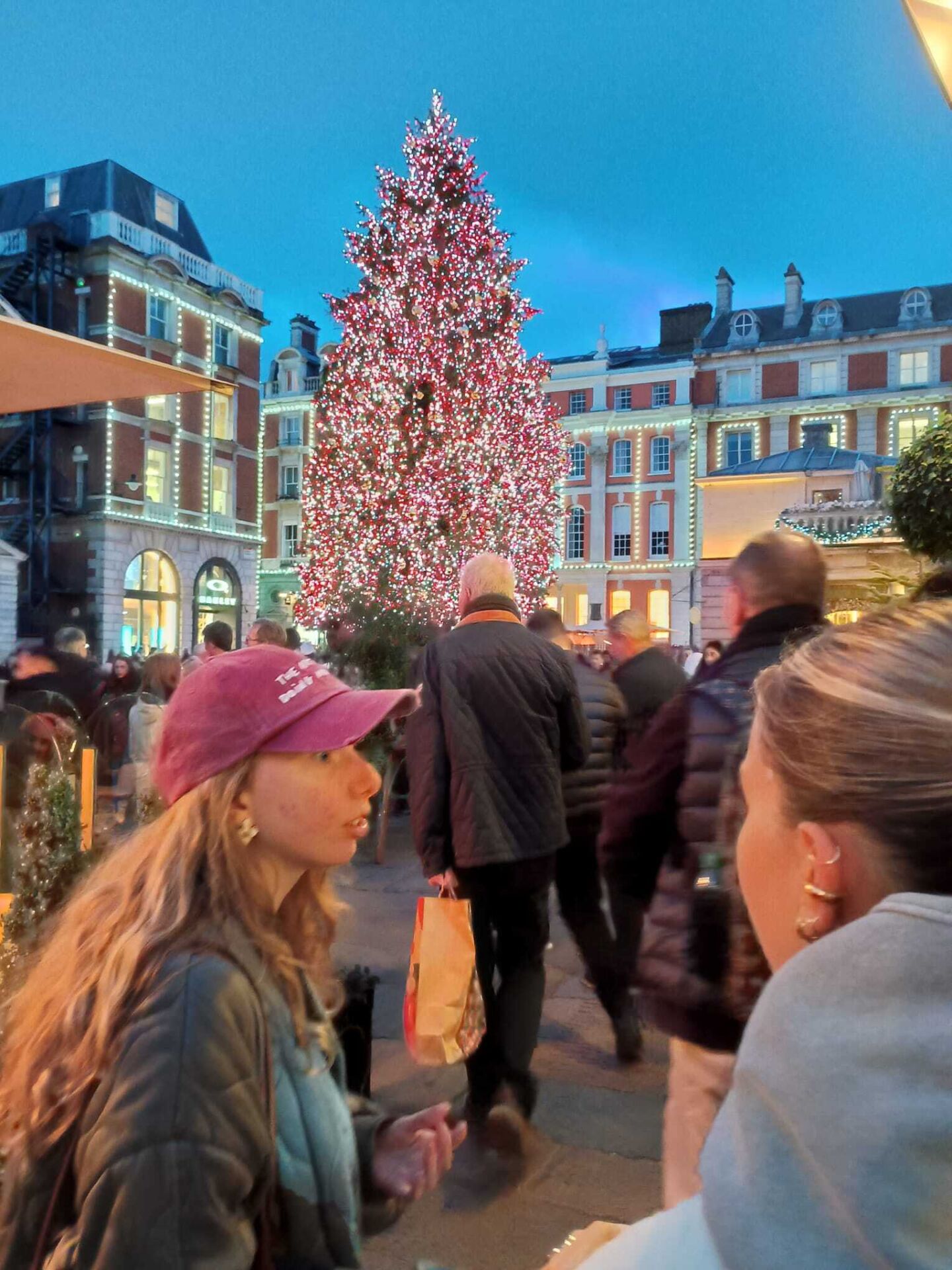 81 (lights) English student's in front of Covent Garden's Christmas tree