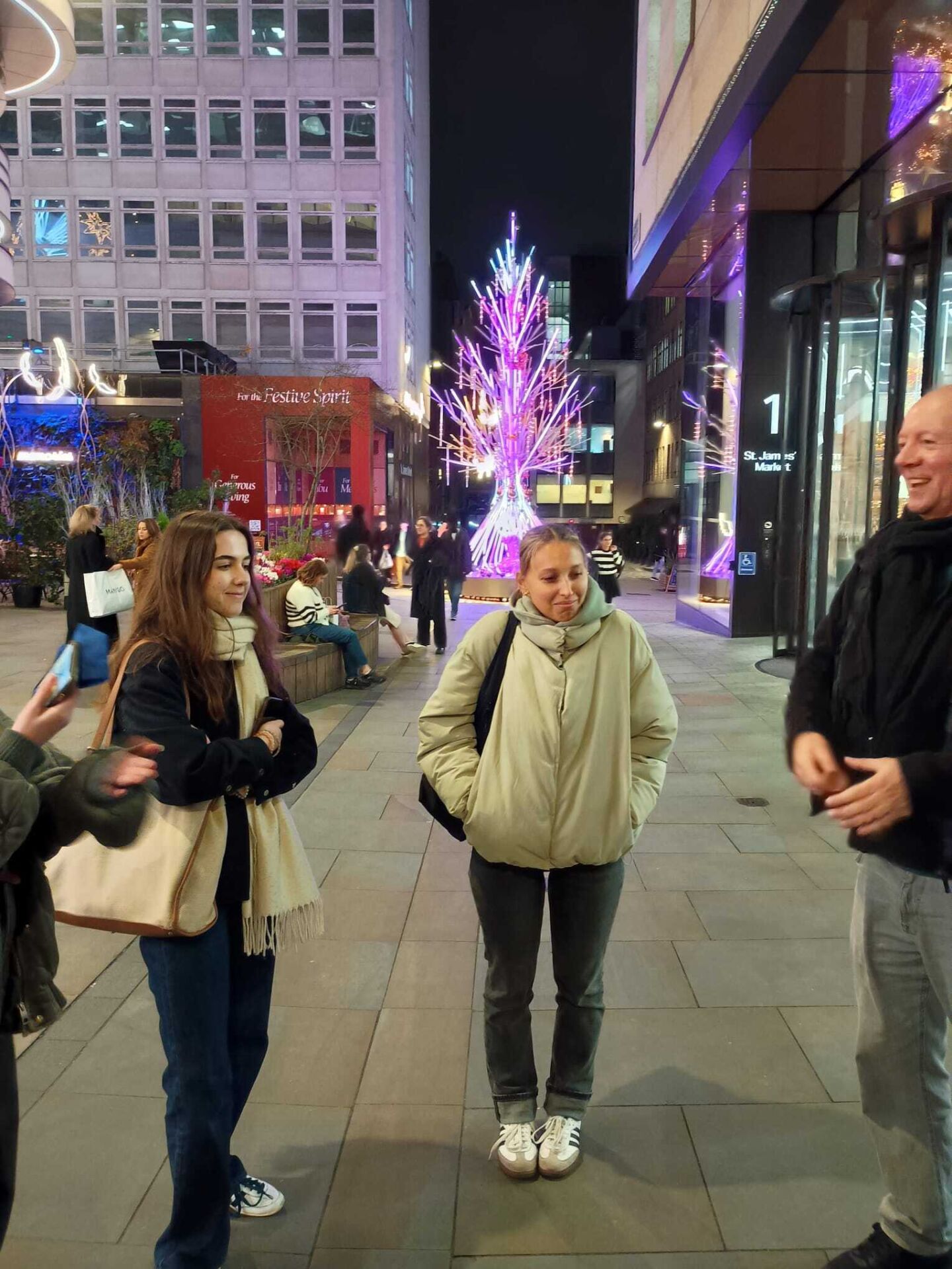 83 (lights) English students with London's Christmas decorations