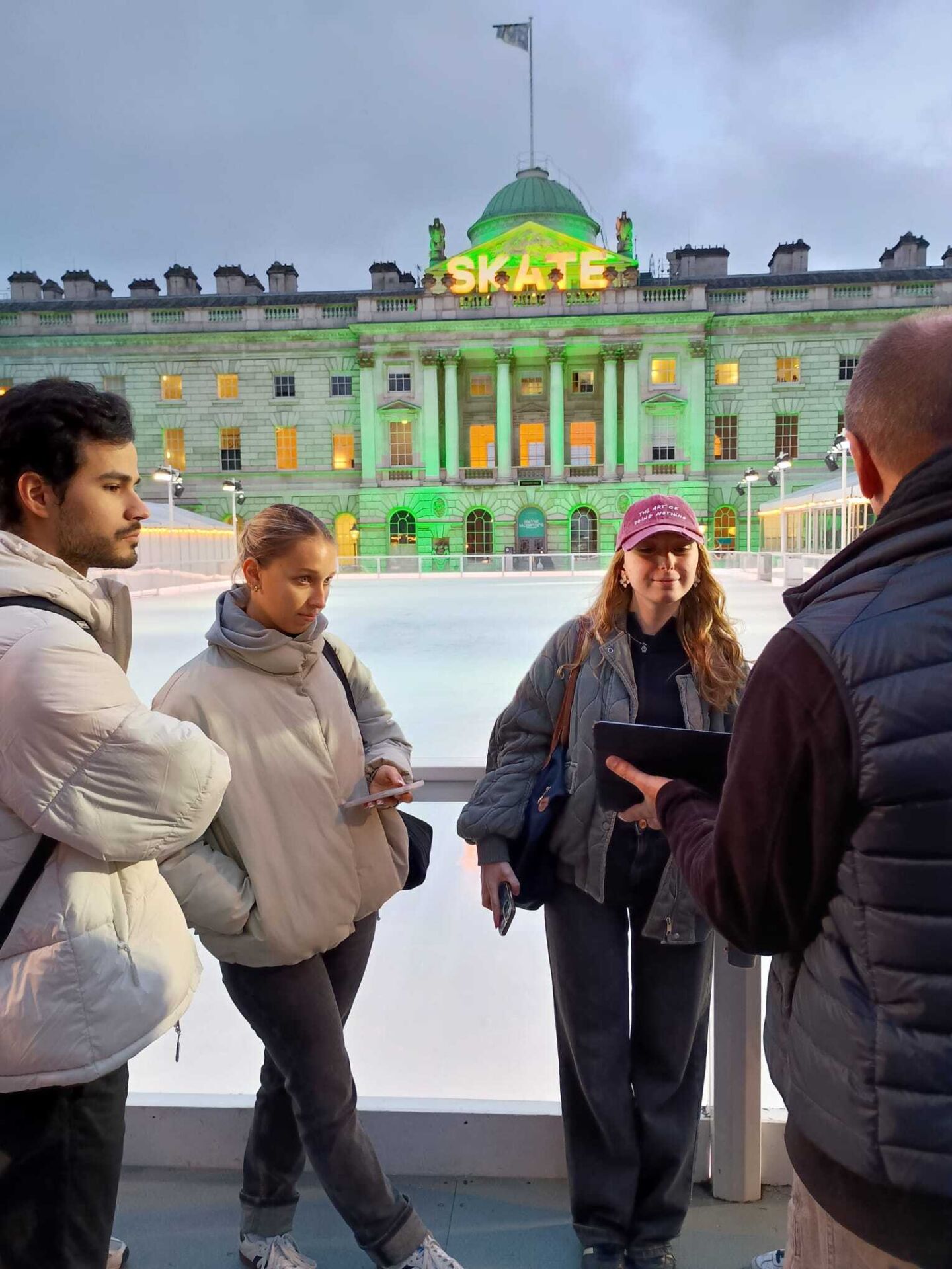 84 (lights) English students outside one of London's outdoor Ice rinks