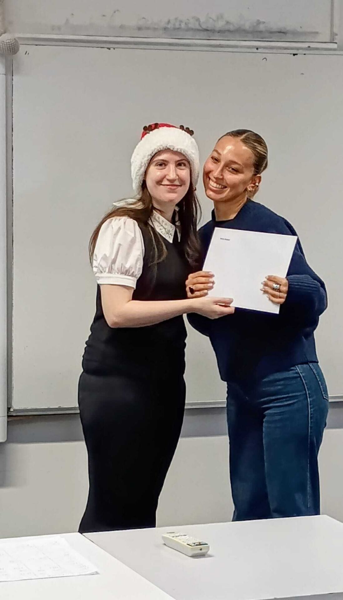 KAE student with their certificate