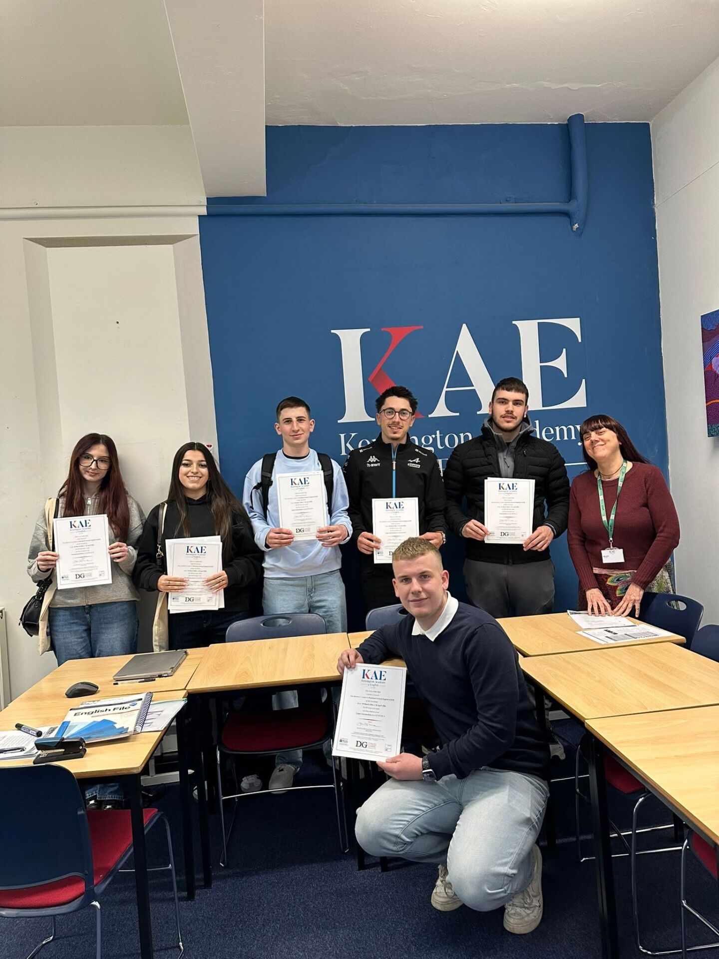 KAE students and their teacher at their Graduation ceremony